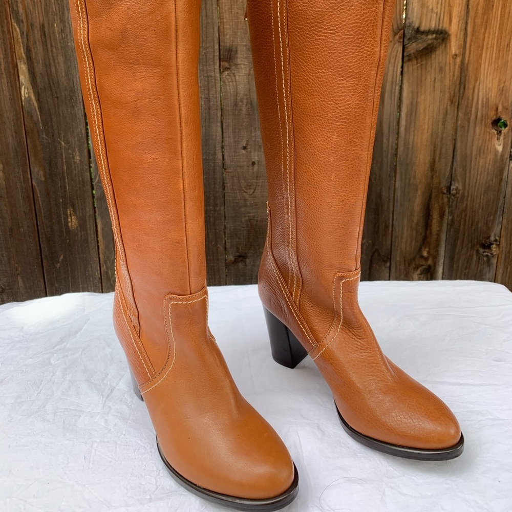 Genuine leather cognac brown below knee boots with rear zipper, 2.75 block heel.